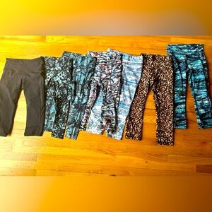 Lululemon lot 7 pr yoga running capri mid calf workout pants great cond Sz 4